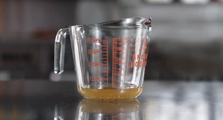 Measuring cup with a little grease