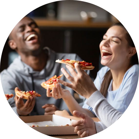 people having fun and enjoying pizza